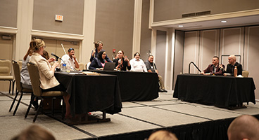 A view of the full stage of actors participating in the Annual Mock Trial at National Convention.